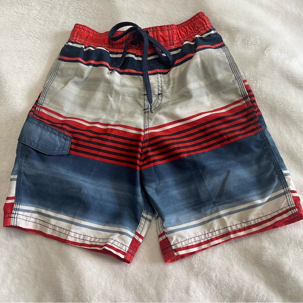 Boy’s Kanu Surf Swim Trunks. Size 7/L Flaw